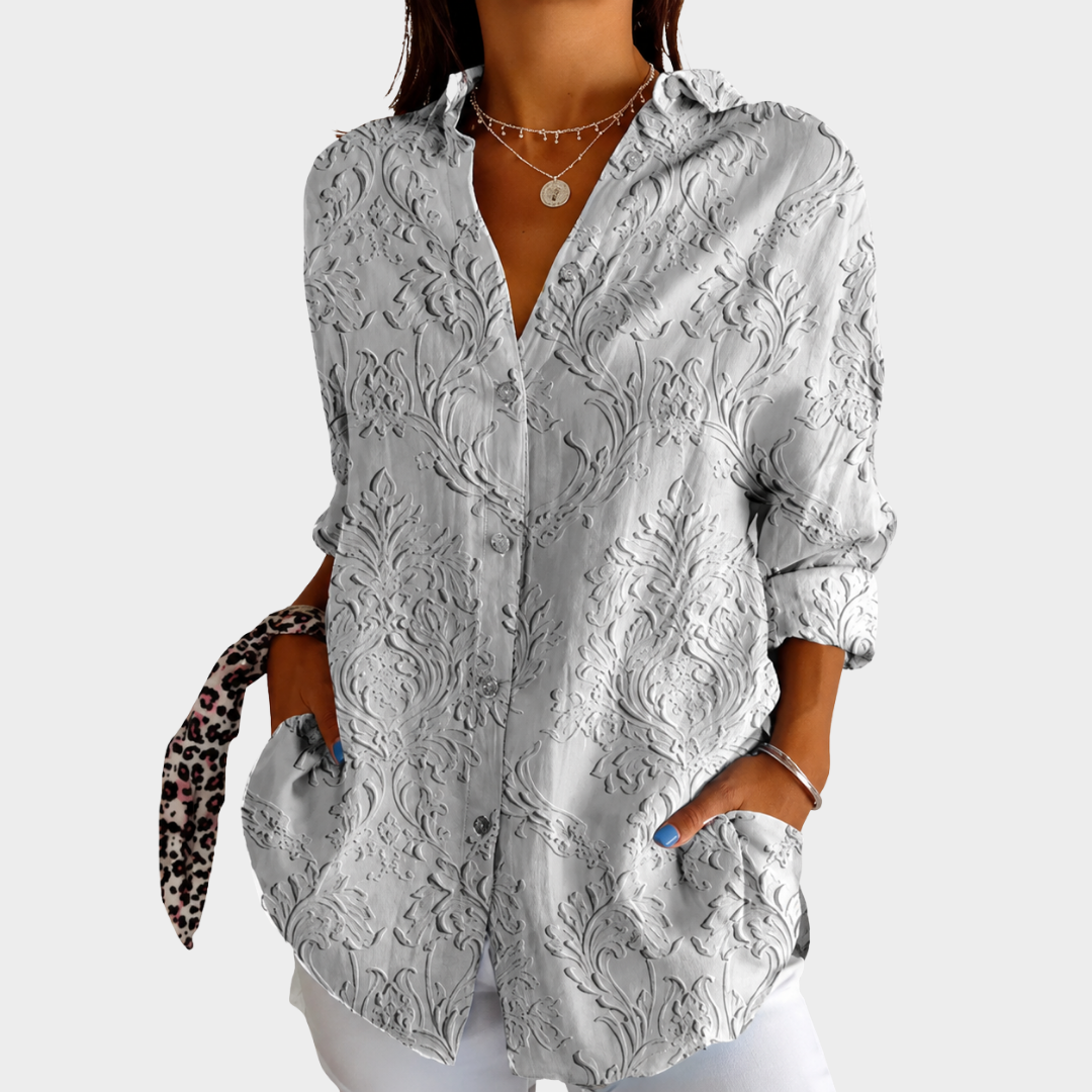 Light and colorful blouse with print